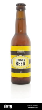 honey-beer-in-glass-bottle-with-fictive-design-bottled-honey-lager-isolated-on-white-backgroun...jpg